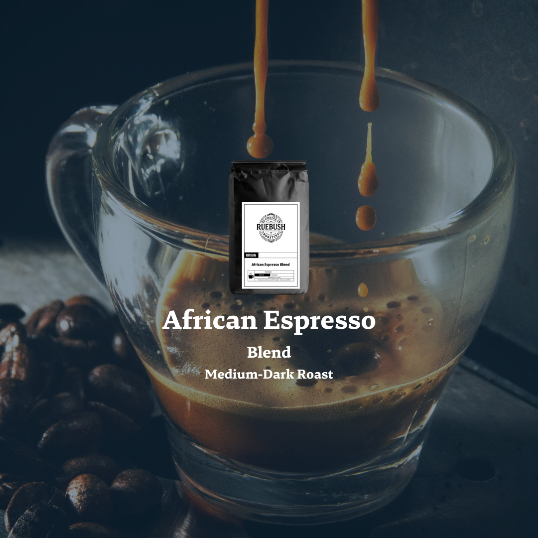 Glass of coffee with a package labeled African Espresso Blend and coffee beans on a dark background.