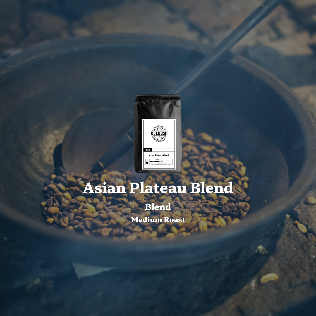 Bag of Asian Plateau Blend coffee in a dark container with coffee beans