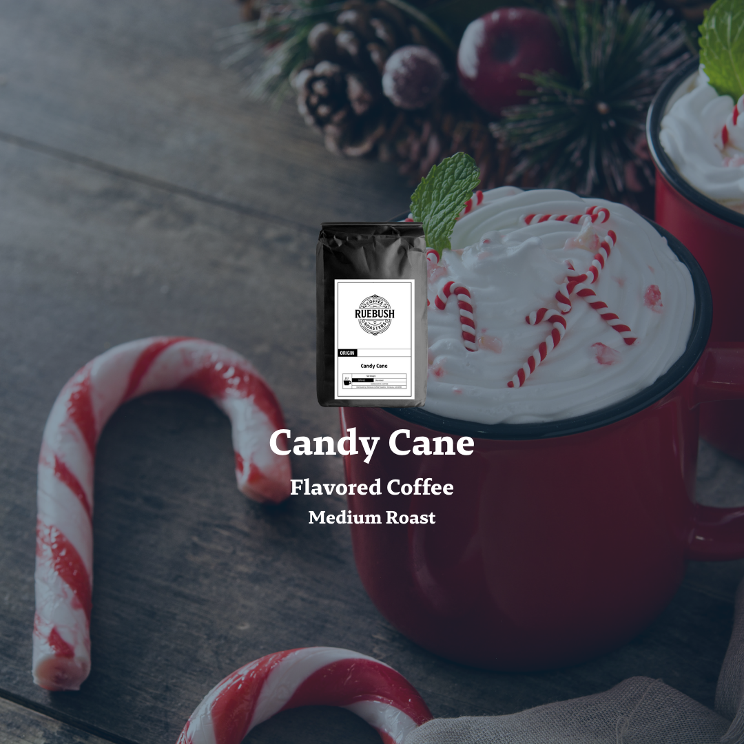 Candy Cane Flavored Coffee package with a red mug and candy canes on a wooden surface