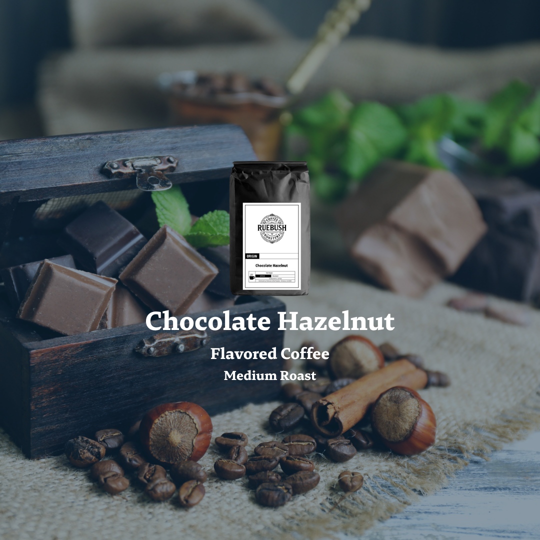 Coffee package labeled Chocolate Hazelnut Flavored Coffee with coffee beans, chocolate pieces, and hazelnuts on a rustic background