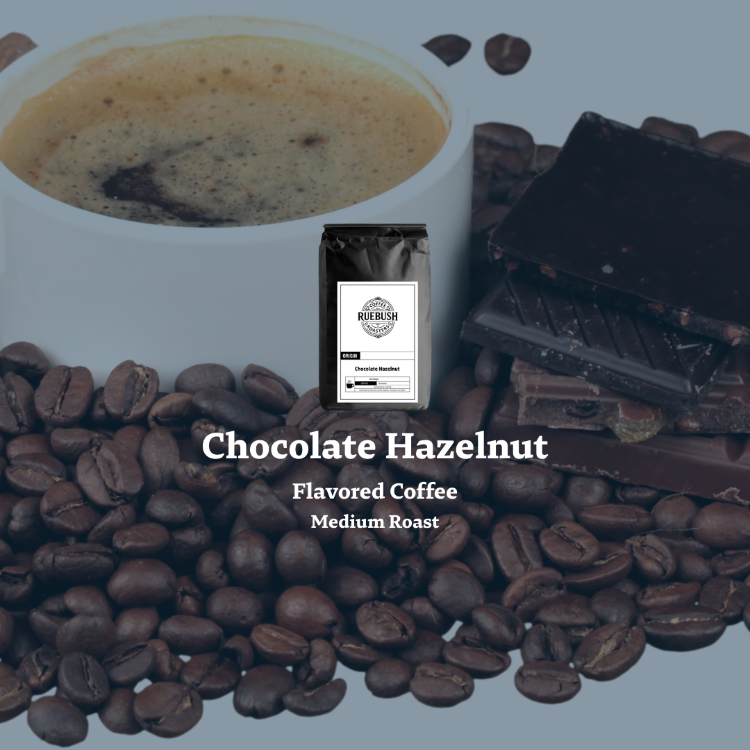 Chocolate Hazelnut flavored coffee package with coffee beans and chocolate pieces on a gray background