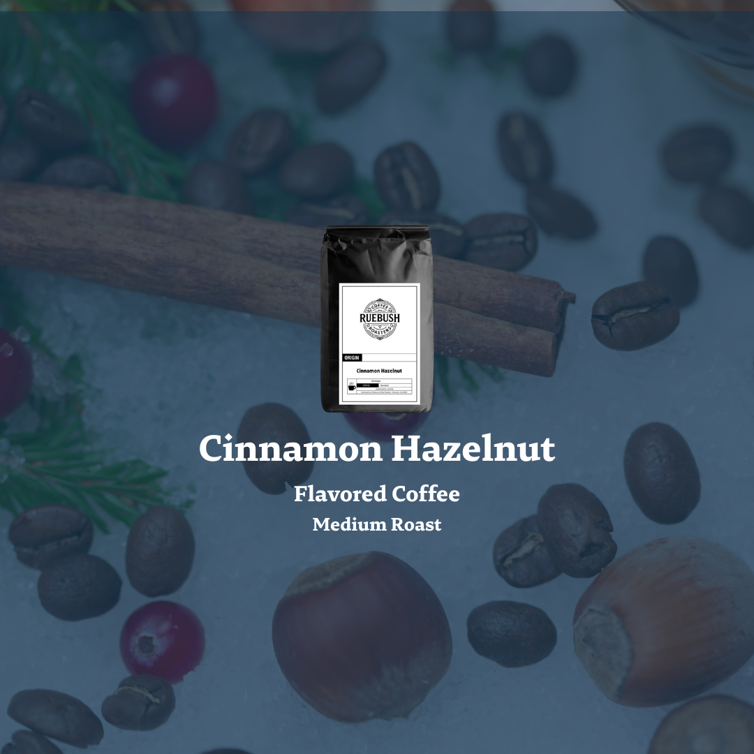 Cinnamon Hazelnut flavored coffee package with coffee beans and cinnamon sticks on a blue background