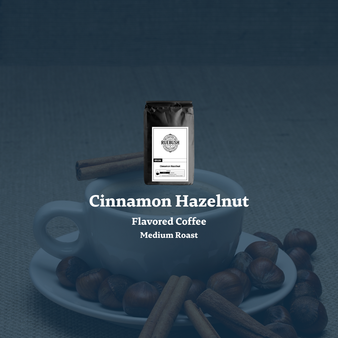 Cinnamon Hazelnut flavored coffee package on a blue cup with coffee beans and cinnamon sticks