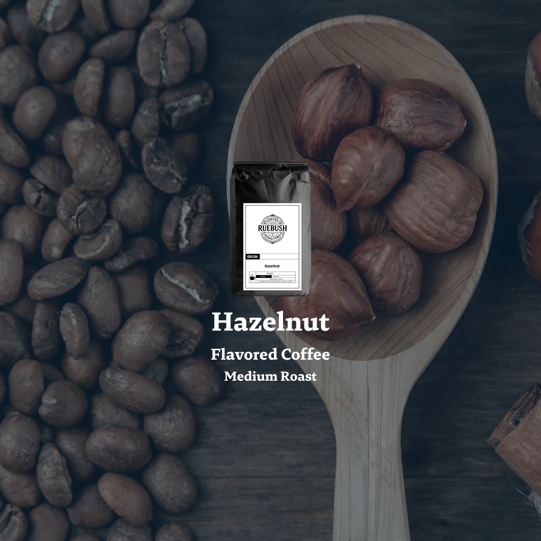 Hazelnut flavored coffee package on a wooden spoon with hazelnuts and coffee beans
