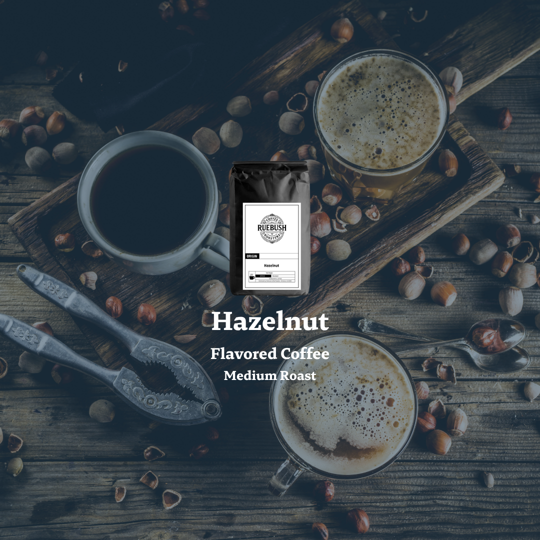 Hazelnut flavored coffee with coffee cups and hazelnuts on a wooden surface