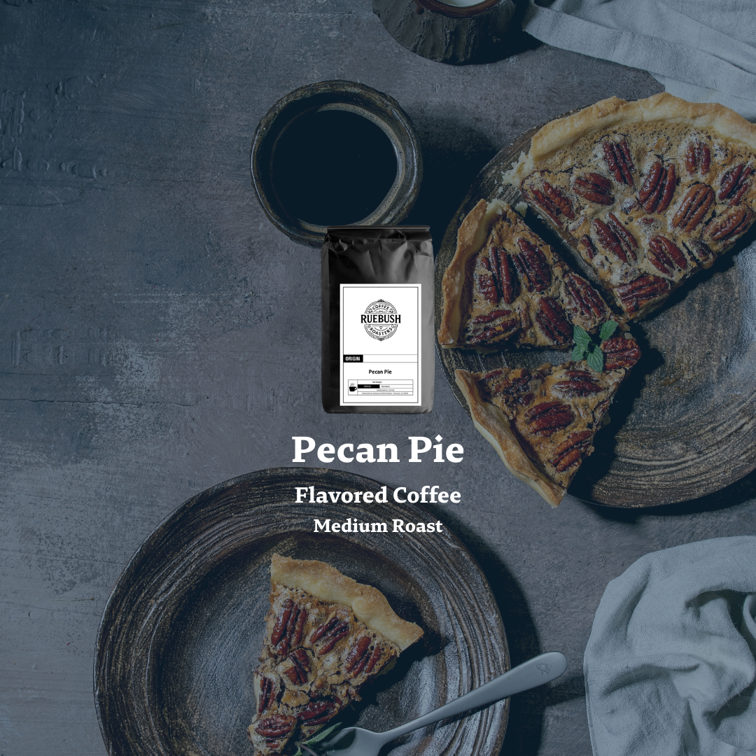 Pecan pie slices on plates with a bag of pecan pie flavored coffee on a dark surface