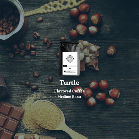 Turtle flavored coffee package with coffee beans, chocolate, and nuts on a wooden surface