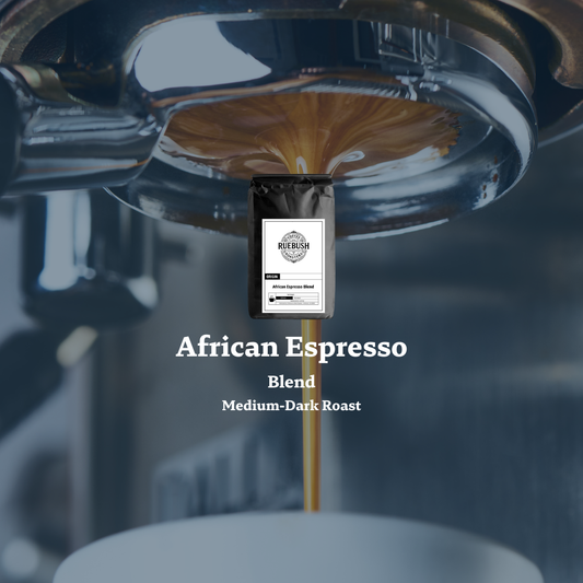 Coffee bag labeled African Espresso Blend with a blurred coffee machine in the background