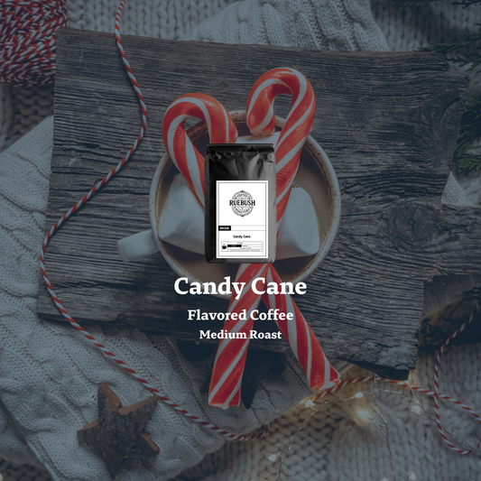 Candy Cane Flavored Coffee package with candy canes on coffee mug and a wooden surface