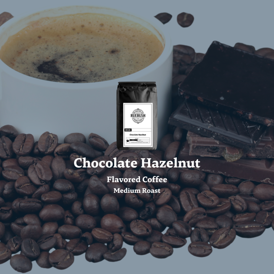 Chocolate Hazelnut flavored coffee package with coffee beans and chocolate pieces on a gray background