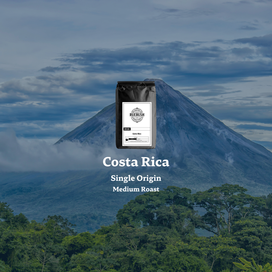 Volcano in Costa Rica with coffee text overlay saying single origin and medium roast