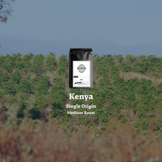 Coffee bag labeled Kenya Single Origin Medium Roast with a coffee farm in background