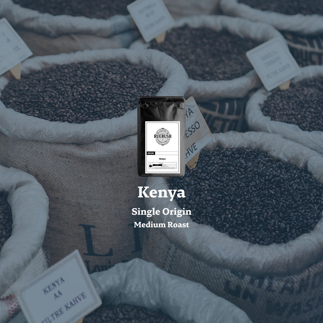 Bags of coffee beans with a coffee bag in the center labeled Kenya Single Origin Medium Roast